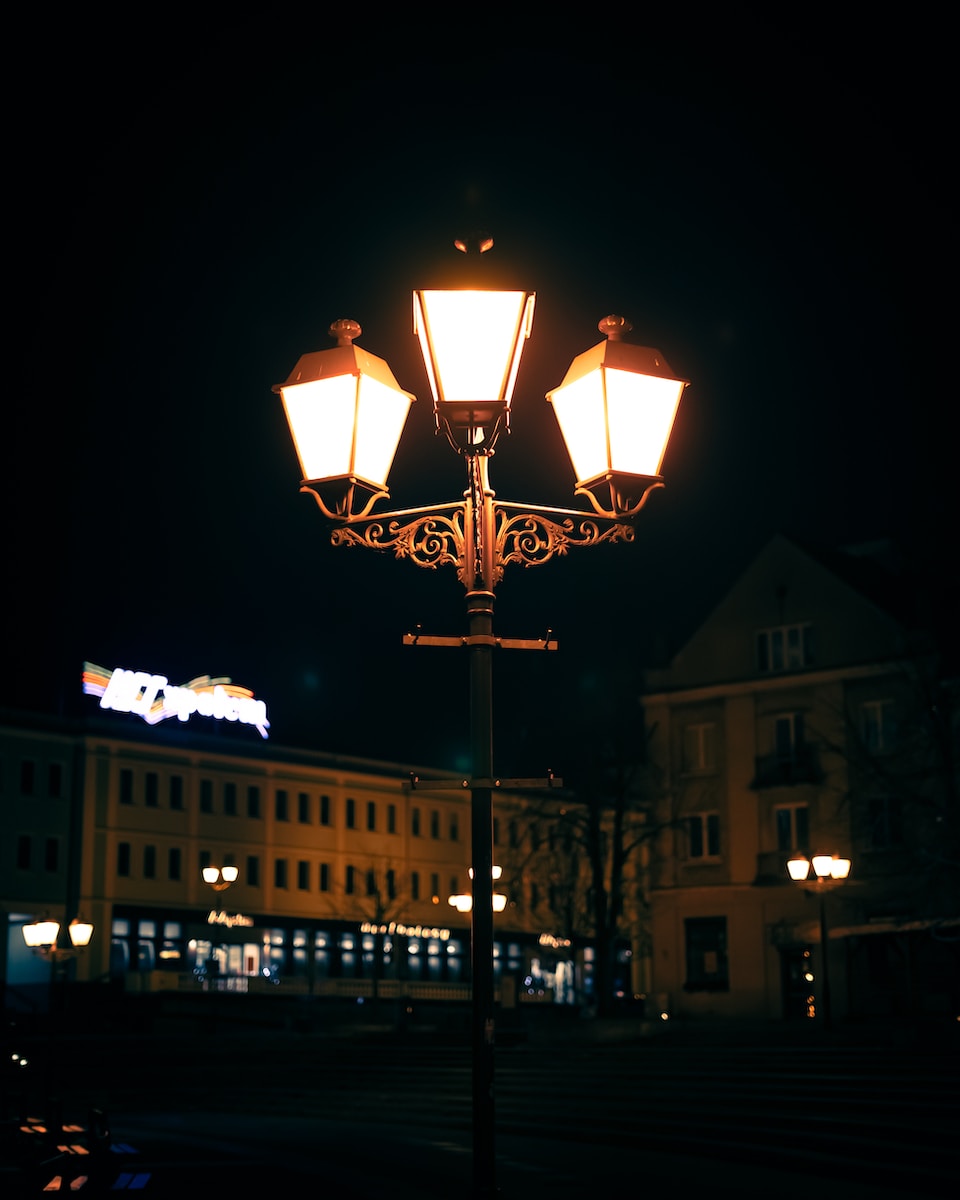 black and white street light turned on during night time