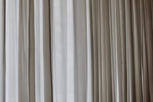 white and gray window curtain