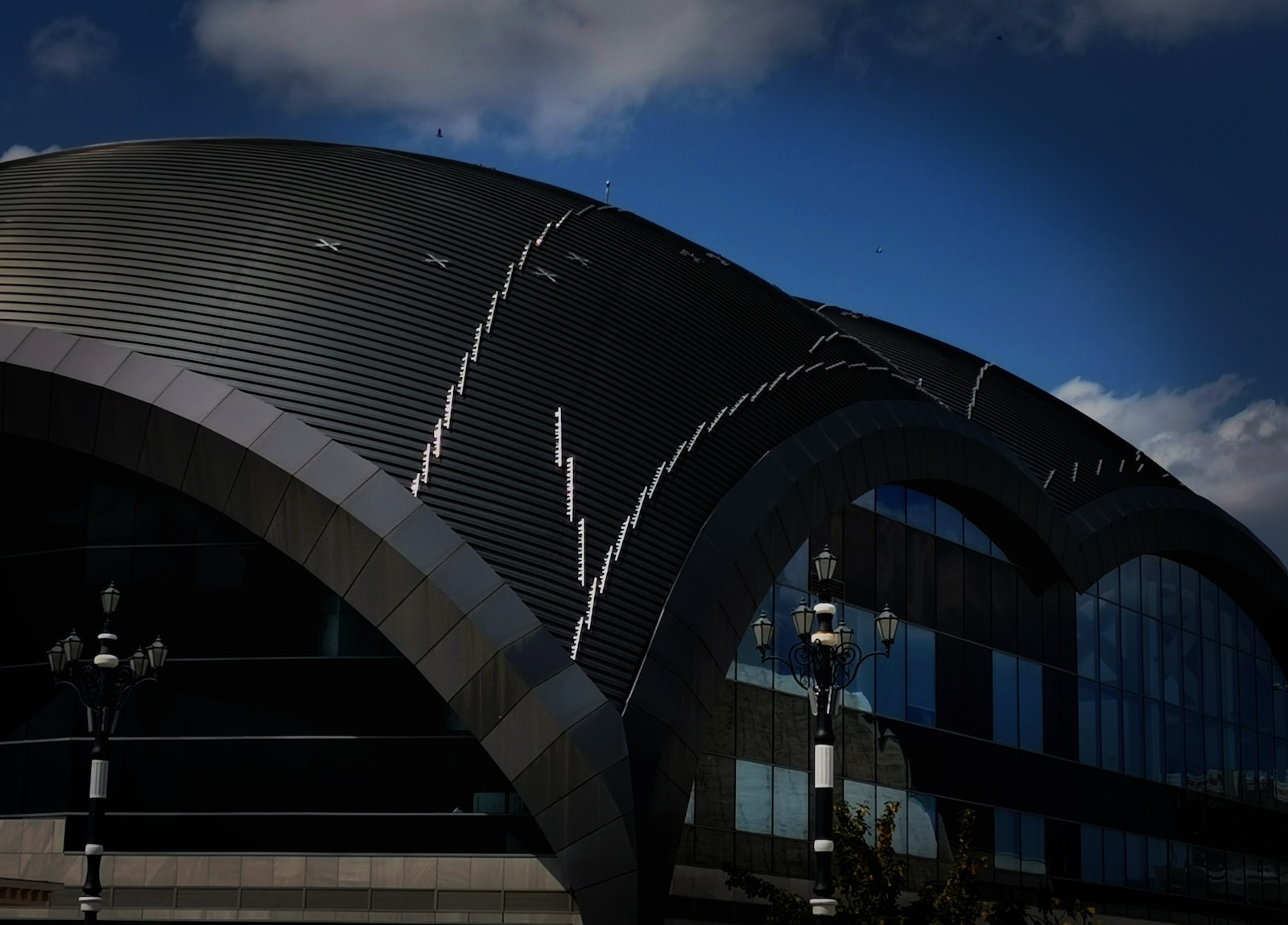 a building with a curved roof