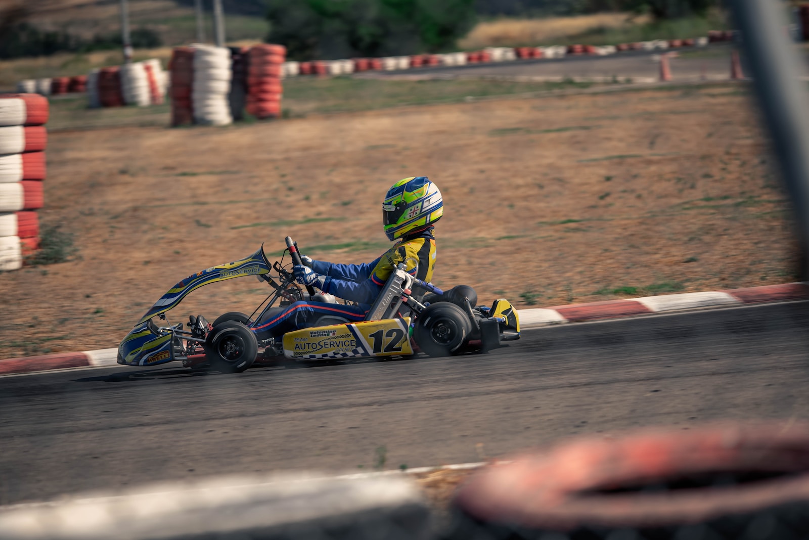 a person driving a go kart